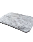 A self-heating pet bed or mat, no electricity needed, for cats and dogs, providing extra warmth.